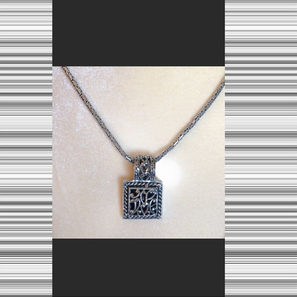 Silver necklace with square filigree pendant